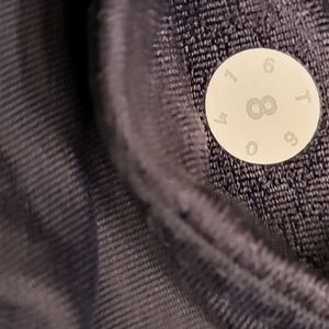 Lululemon black leggings with pockets and reflective dots size 8